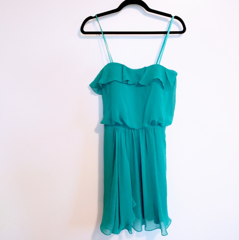 Cocktail dress with ruffle top, sleeveless. Aque size 10